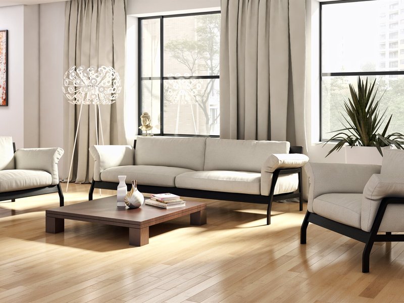 white couch and armchair on brown laminate floor from Stoller Floors in Orrville, OH